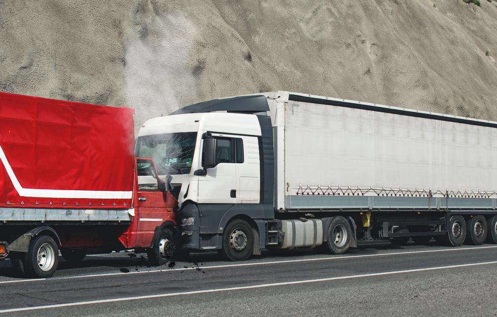 Semi-truck damage after a highway collision in Texas